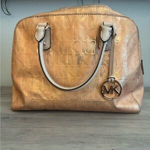 Michael kors rose gold metallic hand bag